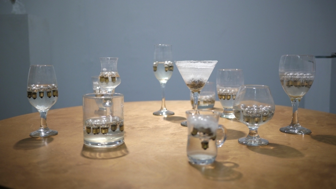 The Glass Pieces,  glassware, lightbulbs, salt, and water installation